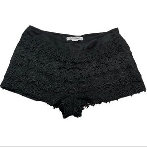 Black lace shorts.